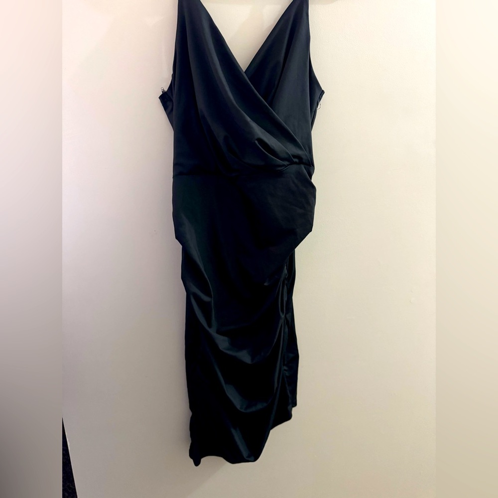 Size M, black dress by Yestto, NWT.